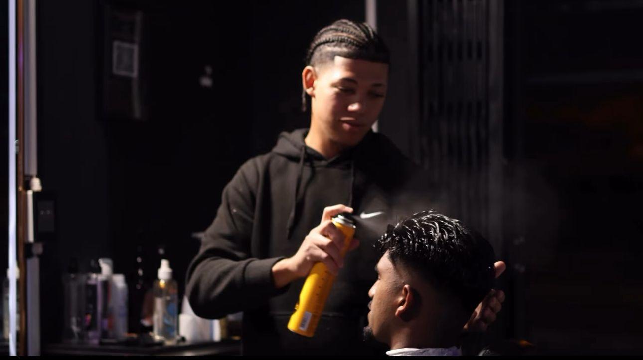 Close fade haircut with sharp lines
